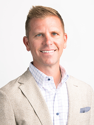 A person in front of a background.