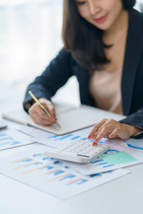 woman calculating banking