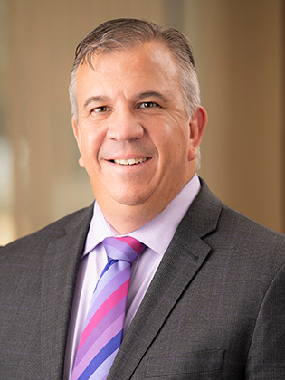 A person in front of a background.